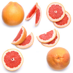 Set of fresh whole and cut grapefruit and slices isolated on white background. From top view