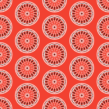 African flower seamless pattern. Abstract floral shapes on red background.