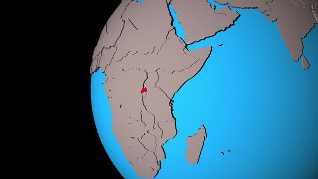 Closing in on Rwanda on political 3D globe. 3D illustration.
