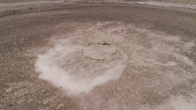 Mud volcano bledug kuwu. aerial view volcanic plateau with geothermal activity and geysers, Indonesia java. aerial view volcanic landscape