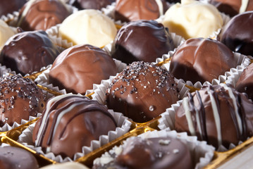 mixed white, brown, dark selfe made chocolate praline