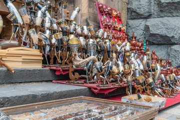 Street market in Tbilisi. On the ground horns for drinking wine. Antique items