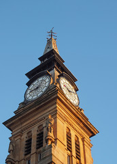 Fototapeta na wymiar the clock tower of the historic victorian atkinson building in southport merseyside against a blue summer sky