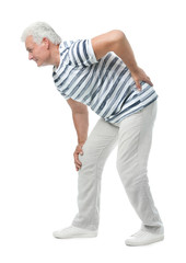 Naklejka premium Full length portrait of senior man having knee problems on white background