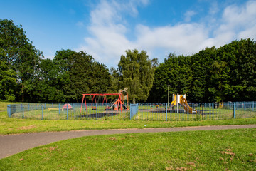 Obraz na płótnie Canvas Empty kids playground near Blackdam Ponds in Basingstoke in Hampshire in England. Corona virus lockdown. 