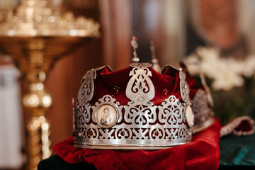Fototapeta na wymiar Russian Eastern Orthodox Church wedding crowns and rings