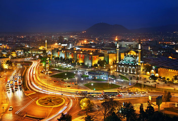 The central square of Kayseri city, the Cumhuriyet ("Republic") Meydani,  with the Yeni Camii ("New Mosque") and the Citadel of the old fortified town. Turkey.