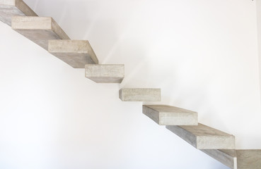 Minimal and modern home interior, with a concrete block stair