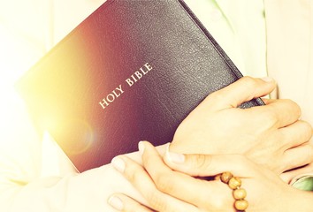 Praying.