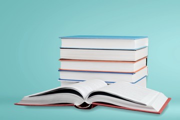 Open book isolated on white and letters