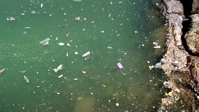 Trash, plastic, garbage, bottle... environmental pollution on the beach - Sea Pollution