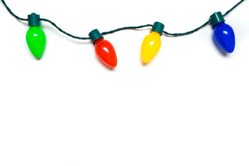 Colorful Christmas lights on a white background - Powered by Adobe
