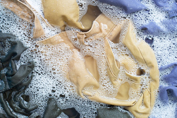 Trousers soak in powder detergent water dissolution. Laundry concept