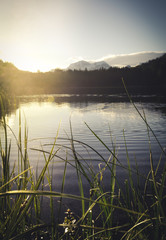 Wonderful Sunrise at Hintersee Lake in Bavarian Alps. Awesome Alpine Highlands during sunrise. Amazing Autumn Natural Background.