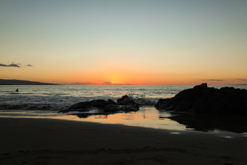 The sun sets on the south shore of Maui near Kiheh and Wilea