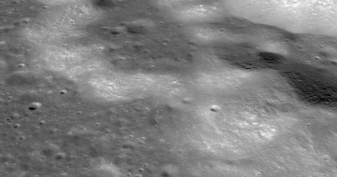 Medium-altitude circular tracking shot of foothills meet plains, western Montes Jura range. LAT 44.51 LONG 323.7. Reversible, seamless loop. Elements of this image furnished by NASA