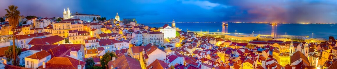 Panorama of The Oldest Alfama District in Lisbon in Portugal. Townscape Scenery Was Made During a Blur Hour.