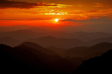 Majestic sunset sky over the mountains landscape