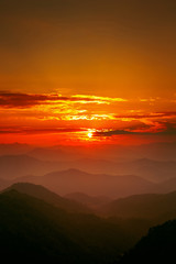 Majestic sunset sky over the mountains landscape
