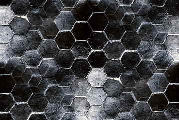 Hexagonal bricks pattern of walkway or pathway with stains as abstract material textured and background