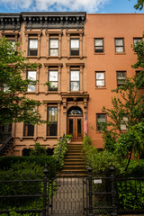Fototapeta na wymiar Historic brownsone building facade in Clinton Hill, Brooklyn, New York