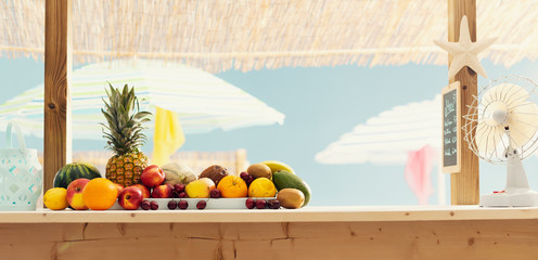 Kiosk with fresh delicious fruit at the beach