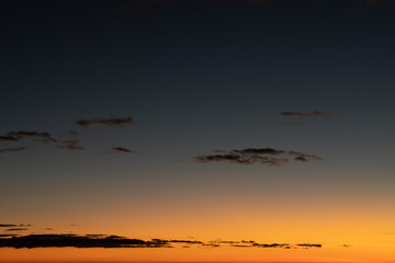 Sky gradient from blue to orange sunset