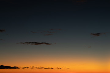 Sky gradient from blue to orange sunset