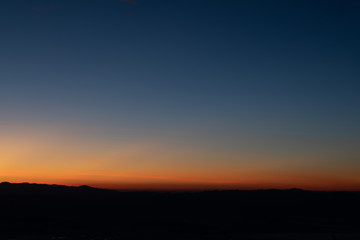 Mountain panorama during sunrise. Beautiful natural panoramic landscape in the summer time