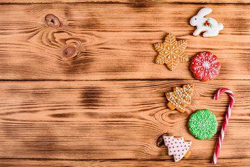 Christmas homemade gingerbread cookies on wooden table. It can be used as a background