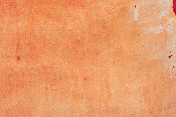 Texture of a concrete wall with cracks and scratches which can be used as a background