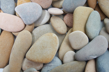 Fototapeta na wymiar Abstract smooth round pebbles sea texture background