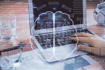 Man typing on keyboard background with brain hologram. Concept of big Data.
