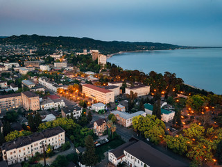 Fototapeta na wymiar Evening resort town Sukhum, Abkhazia aerial view from drone
