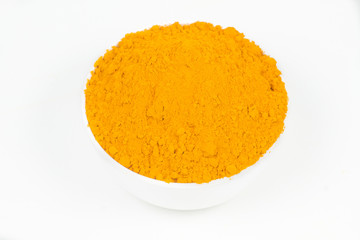 Turmeric powder isolated on a white background