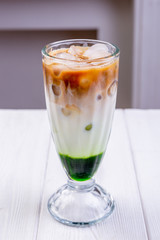 Ice latte cocktail. Cold summer coffee with ice pieces. Non-alcoholic summer coctails. Menu of cafe or restaurant