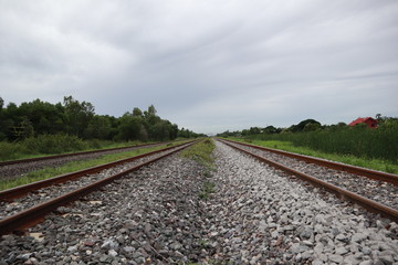 Fototapeta na wymiar railway tracks in the field