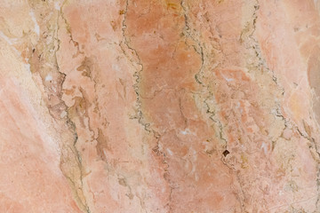 texture of old cracked red, yellow natural marble with stains of different size and color