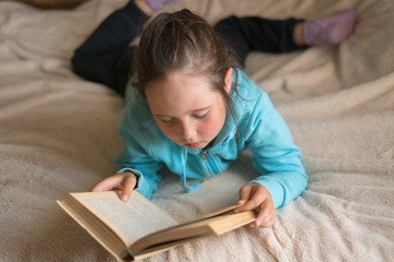 little girl and book