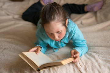 little girl and book