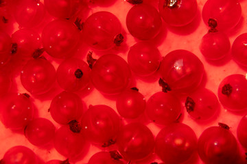 Red currant in red jelly. A delicious background for use in the media.