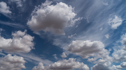 Obraz premium white clouds float across the blue sky