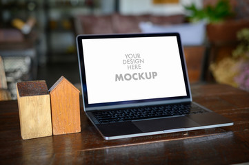 Mockup of business man using laptop screen for your advertising text message Laptop with blank...