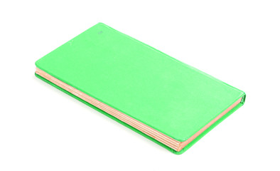 Closed old green book isolated