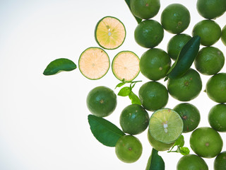 Lime and leaves isolated on a white background