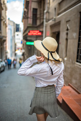 Beautiful girl walks at the street