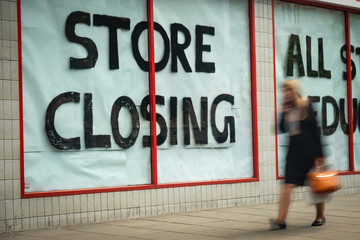Store Closing sign on shopping high street 