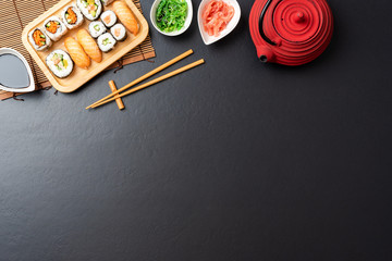 Japanese sushi set with teapot. Top view