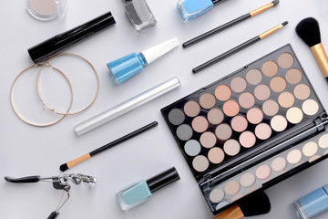 Set of decorative cosmetics on light background