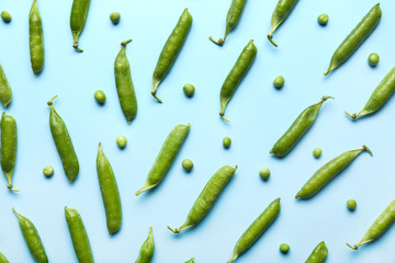 Tasty fresh peas on color background